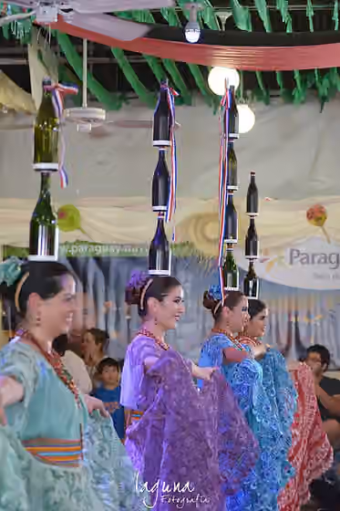 Paraguayan bottle dance — 500px provided description: Actuaci?n de el grupo internacional de danza Jeroky Paraguay en la Feria de los Pueblo de Fuengirola, M?laga.