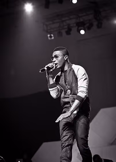 Afrobeats — Wizkid performing at the Iyanya vs.