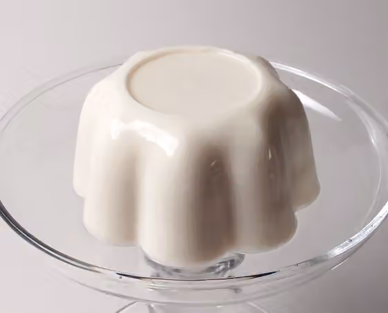 Blancmange — A serving of blanc-manger, made according to a rather purist recipe, containing only almonds, water, milk, sugar and gelatin.