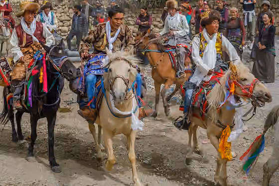 Orang Lhoba — The local people of Upper Mustang, known as Lhobas, celebrate the end of the a good crop season with 3-day horse racing festival.