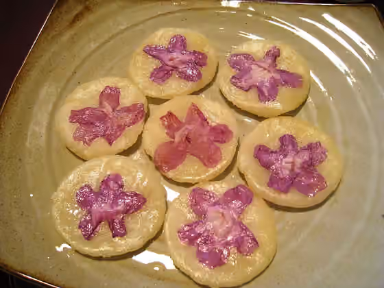 hwajeon — Jindallae hwajeon (진달래 화전, literally azalea pancake) is a variety of jeon , Korean styled pancakes, made with Rhododendron mucronulatum , glutinous rice flour, and sugar.