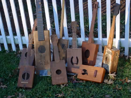 Cigar box guitar — A collection of antique cigar box guitars, banjos and ukuleles.