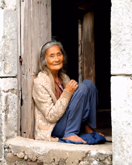 orang Ivatan — An 85-year old Ivatan woman sitting at her house's door