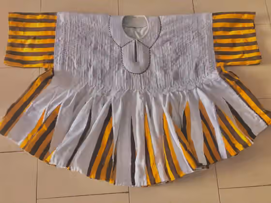 Ghanaian smock — This is a locally produced smock in Northern Ghana precisely Tamale
