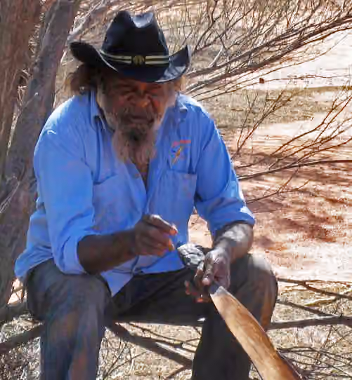 Pitjantjatjara — An anangu tour leader at Uluru, doing a public demonstration.