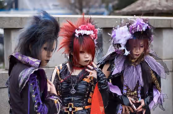 Visual Kei — Business as usual in Tokyo: The Jingūbashi (Jingū bridge) which passes over the Yamanote Line south of Harajuku Station, Tokyo, at the Meiji Shrine gate is a famous gathering place for cosplayers.
