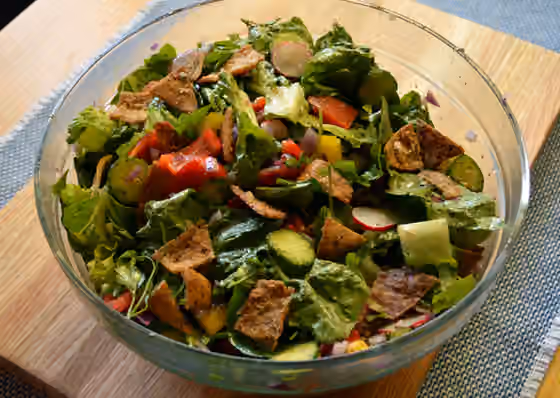 Fattoush — Fattoush salad mixed with leafy greens