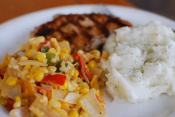 Maque choux — "Mock shoe" Maque choux , zesty dill mashed potatoes and blackened turkey breast.