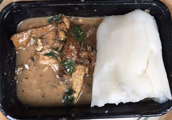 Edo traditional food — White soup and corn meal ( Nigerian food)