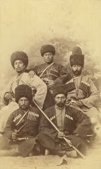 orang Chechnya — Group portrait of five men, seated, facing front.