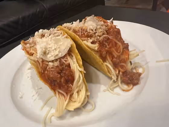 Spageti taco — Spaghetti tacos with spaghetti, sauce, and cheese, popularized by iCarly.