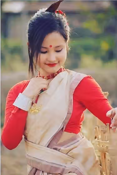 Thengal Kachari people — A Thengal kachari girl in Muga dress.