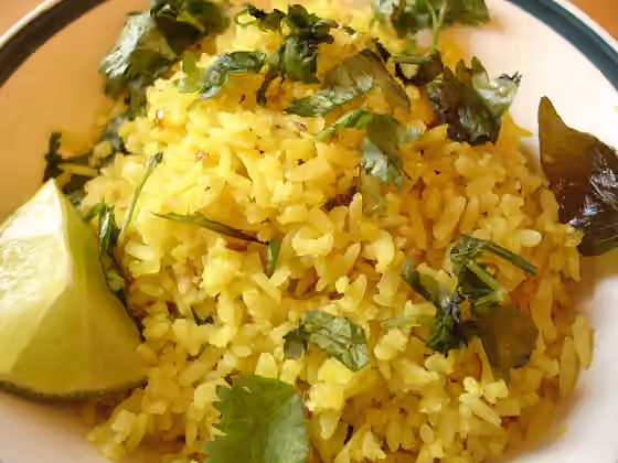 Indori poha — Poha is a very popular breakfast dish in the Indian states of Maharashtra and Gujarat.
