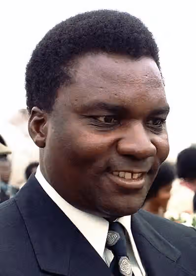 Hutu — President Juvénal Habyarimana of RWANDA arrives for a visit.
