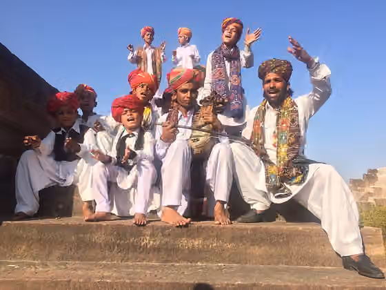 Manganiar — Manganiar children performing with their guru at Mehrangarh Fort, Jodhpur, Rajasthan, India at World Sufi Spirit festival