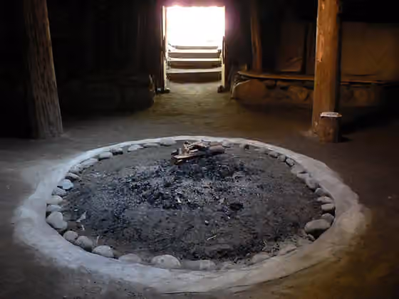 Sinixt — Interior of a Sinixt pithouse in the Slocan Valley .