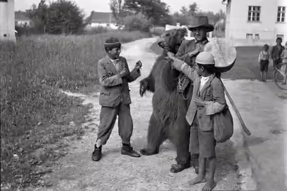 Romani people in Slovenia — Roma with a bear in Šmarca in 1934