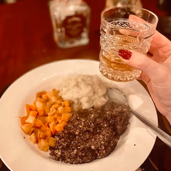 Scottish cuisine — 2024 Burns' supper with haggis, neeps and tatties and a glass of whisky