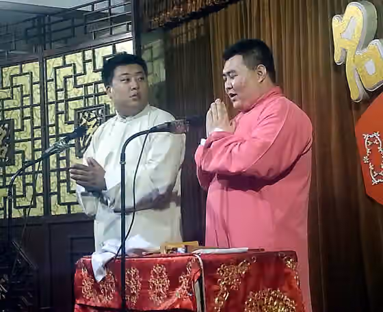 Quyi — Photograph of performers in a crosstalk (xiangsheng) theater in Tianjin, China.