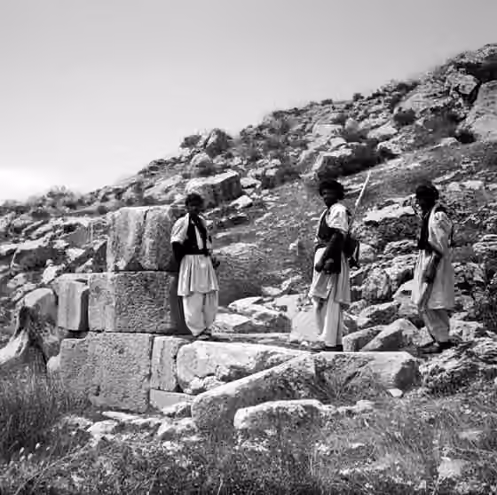 orang Zaza — Zaza men, clad in traditional white garments, stand near the ruins of an old church in Gerger, 1901.
