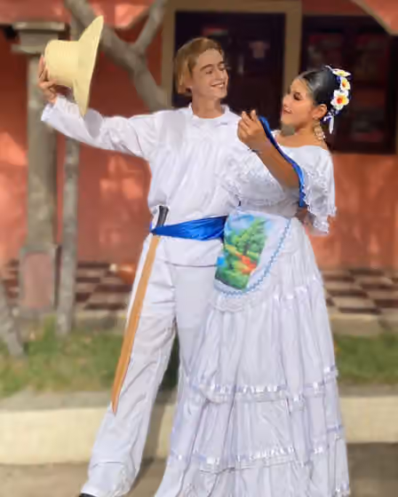 Nicaraguan dance — Marcos Iván Vílchez Ruiz (Daz Zuvr) and Rossely Arianna Medina Quintanilla wearing the traditional folk huipil costume from Telpaneca in Somoto, Madriz, Nicaragua.