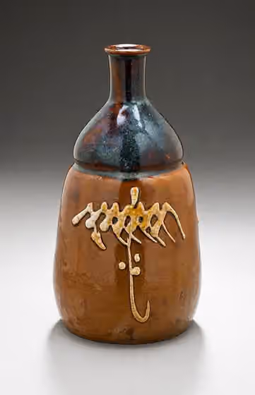 Koishiwara ware — Japan, Edo period, late 18th-early 19th century Alternate Title: Tokkuri Furnishings; Accessories Koishiwara ware; stoneware with brown glaze and white slip Height: 7 1/4 in.