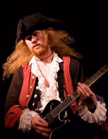 pirate metal — Commodore Redrum performing guitar at Paganfest America on May 14, 2009.