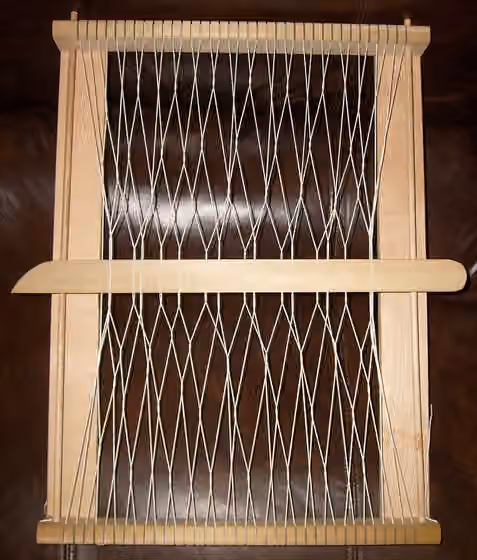 Sprang — Demonstration example of sprang under construction on a lap loom.