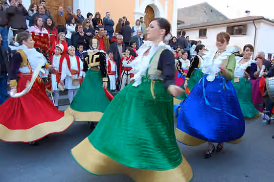 Arbëreshë — Typical Arbëreshë female costumes worn during the Vallje dances in San Basile .