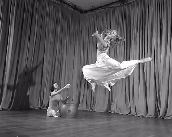 Interpretive dance — One woman dances while another student accompanies her on a drum in an interpretive dance class at the University of Wisconsin-Madison 1949 digital.library.wisc.edu/1711.dl/UW.Archives