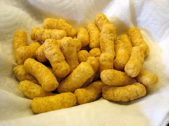 Bamba — Close-up of Bamba snack, to illustrate texture, colour and shape.
