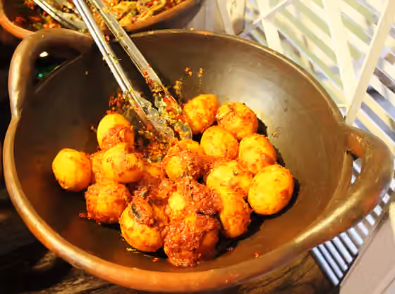 balado — Talua balado , a Minangkabau popular dish in Pekanbaru, Indonesia.
