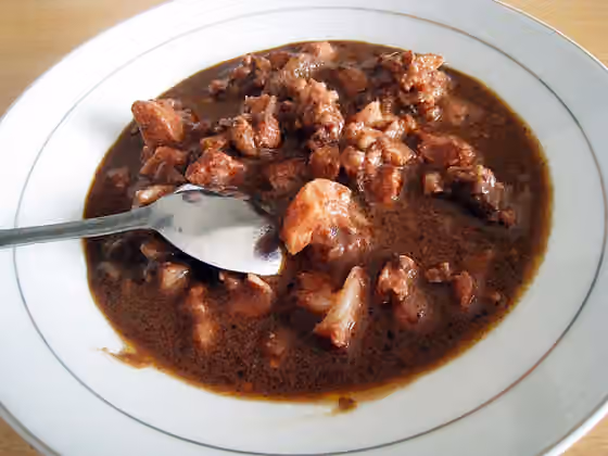 Sangsang — Batak cuisine, the saksang pork stew cooked in its blood and spices.