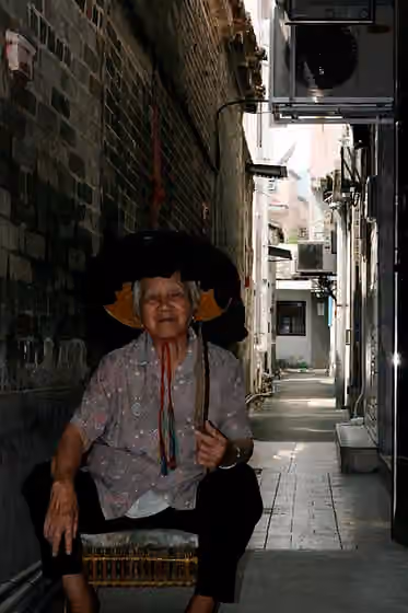 Liangmao — Hakka woman wearing a traditional hat