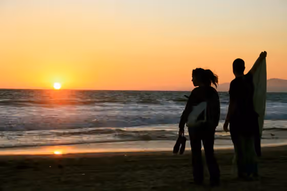California sound — The sunset over Santa Monica Bay at Venice Beach park , Southern California