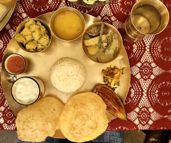 West Bengal cuisine — Bengali vegetarian thali is a Bengali-style meal made up of a selection of various vegetarian dishes which are served on a platter.