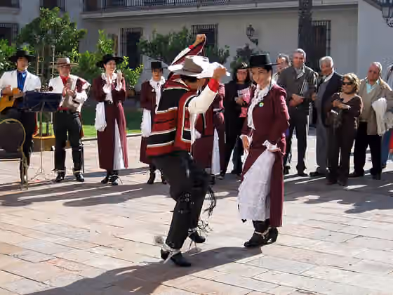 Cueca — People dancing cueca in the Palace of La Moneda