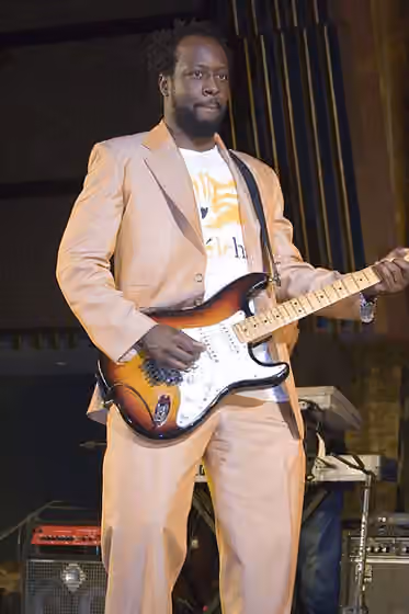 Haitian hip-hop — Wyclef Jean performing at the General Assembly Hall of the United Nations Headquarters in New York City, New York, United States for UNAIDS.