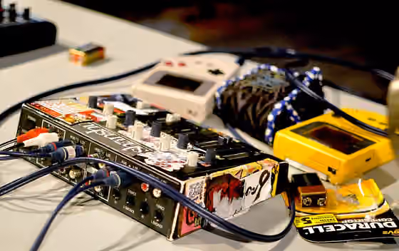 Chiptune — Photo of a mixer and some Game Boys setup for a chiptune musical fest.