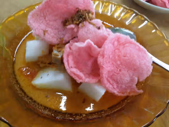 Lontong Dekem — Lontong sayur, rice cakes served with coconut milk curry