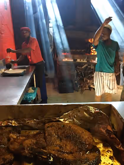 Mzoli's — This is an image of "African people at work" from