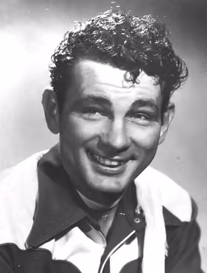 Western swing — Western swing bandleader Adolph Hofner, pictured on an Okeh Records promotional portrait