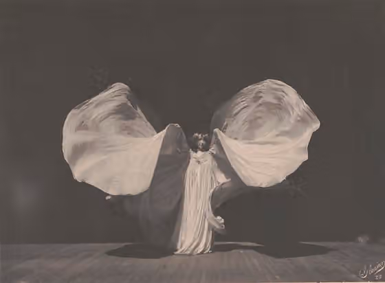 Serpentine dance — 1902 portrait of modern dancer Loie Fuller in one of her signature costumes.