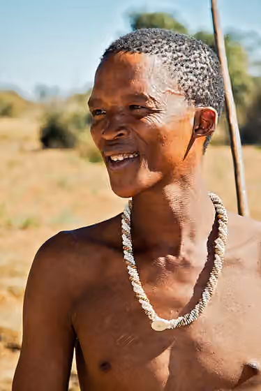Suku Khoisan — A San (Bushman) who gave us an exhibition of traditional dress and hunting/foraging behavior.