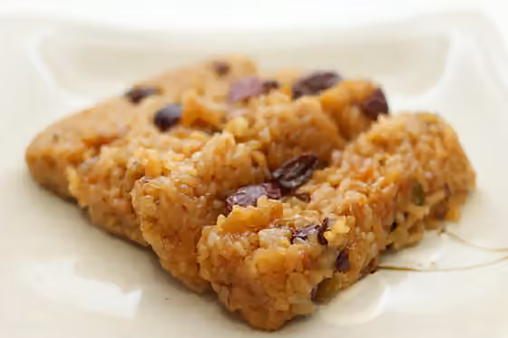yaksik — Sweet rice with nuts and jujubes, a Korean dish made by steaming glutinous rice mixed with honey, sugar, jujubes, soy sauce, sesame oil, chestnuts, pine nuts, etc.