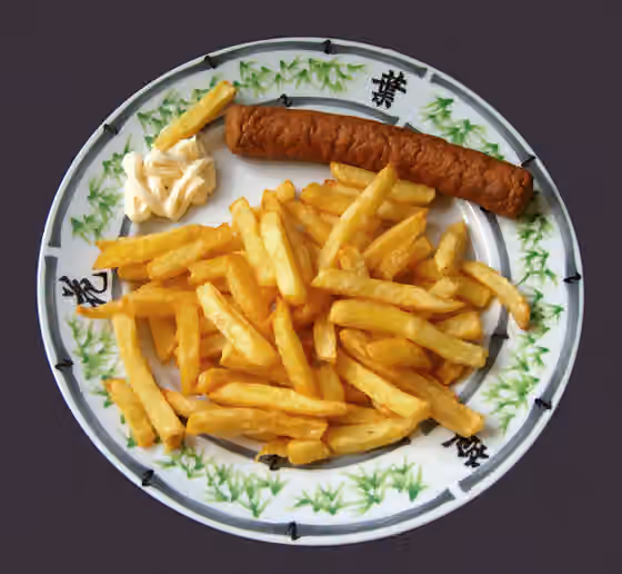 Frikandel — French fries, mayonnaise and frikandel , Dutch fast food