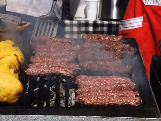Mititei — A traditional Romanian food: Mititei on the grill