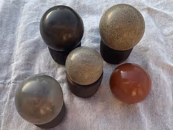 Dorodango — A couple of dorodangos made with different techniques and clay.