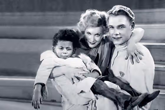 Afro-Rusia — James Lloydovich Patterson , Lyubov Orlova and Sergei Stolyarov in a scene from the film Circus .
