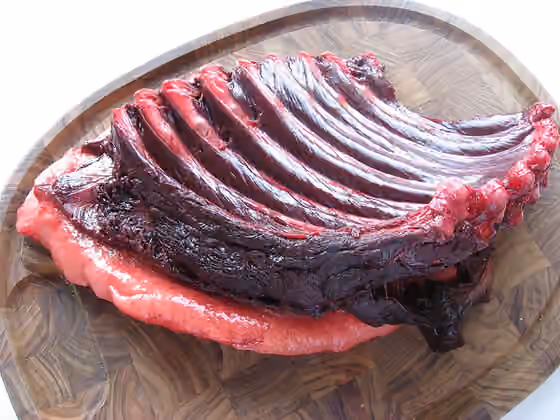 Greenlandic cuisine — Piece of meat from young Harp Seal ( Phoca groenlandica ) bought in Upernavik , Greenland .
